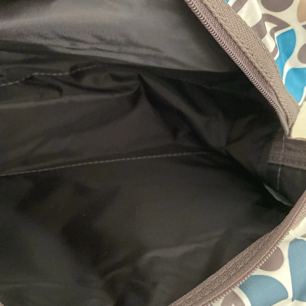 New With Tags LeSportsac Blue/Brown Patterned Cosmetic Travel Overnight Pouch